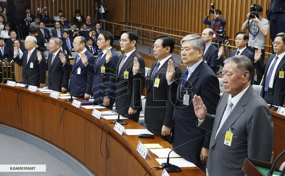 S. Korean tycoons face parliamentary questioning over scandal