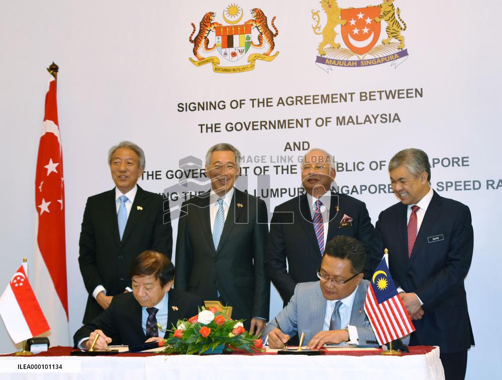 Malaysia, Singapore ink deal to build high-speed railway link by 2026