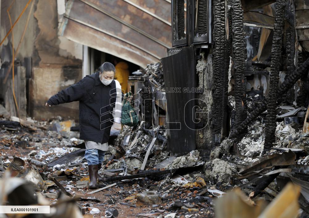 Burned-out site pictured following massive fire