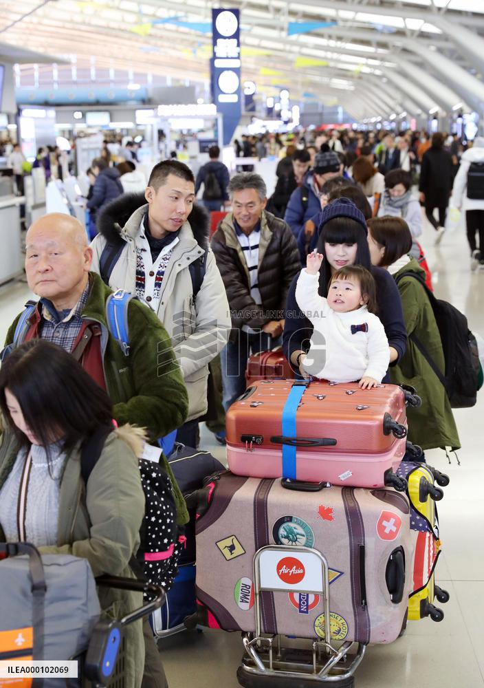 Holiday travelers leaving Japan to spend time overseas