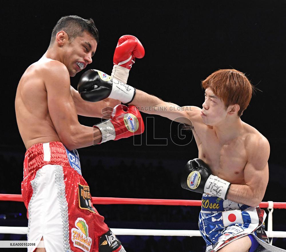 Boxing: Tanaka TKOs Fuentes to lift 2nd world title