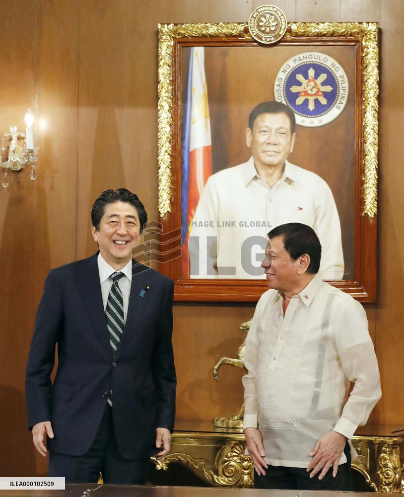 Abe pledges $8.7 billion public-private package for Philippines
