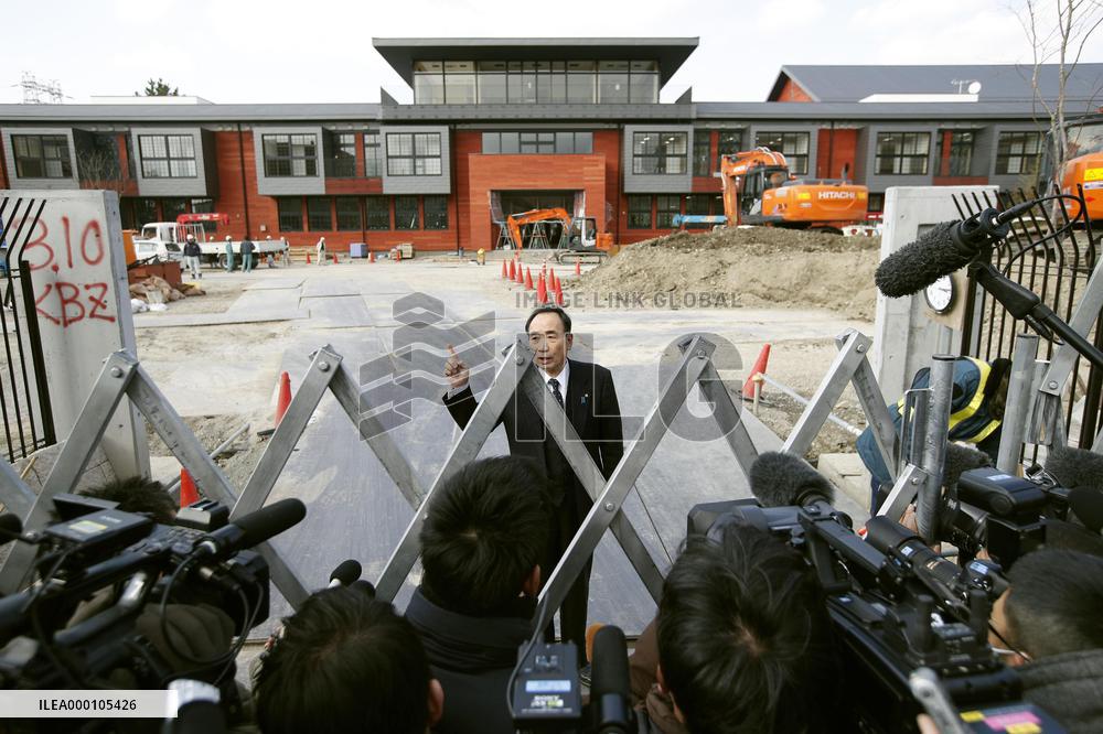 Moritomo Gaken chief Kagoike speaks to reporters