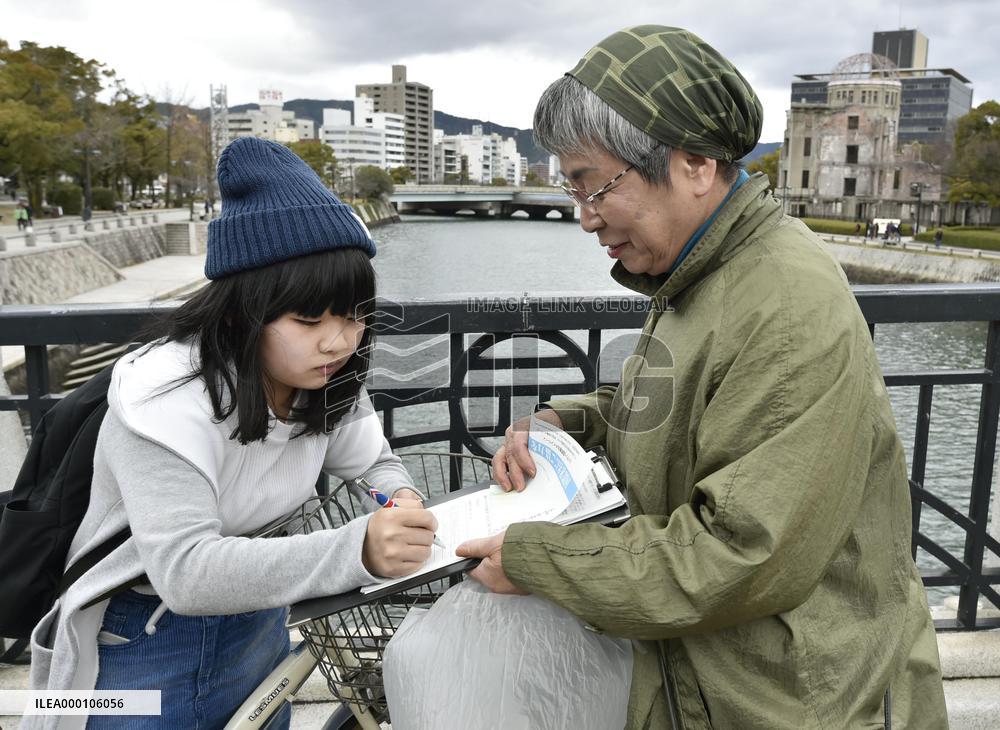 Signature-collecting campaign for treaty outlawing nuclear arms