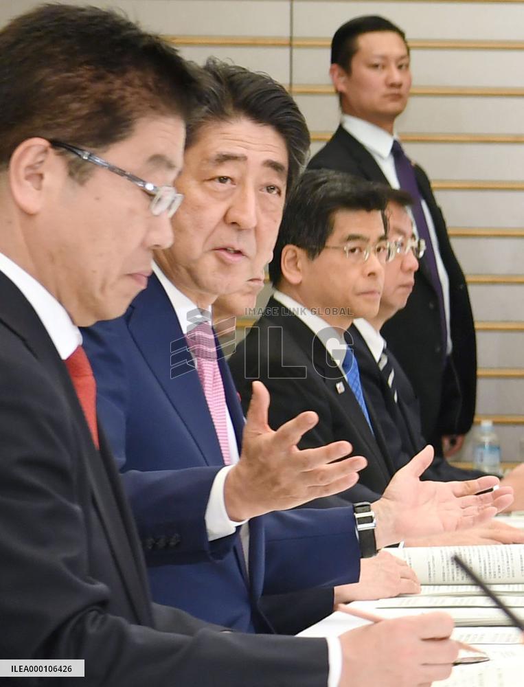 Japan eyes cap on overtime hours, equal pay under labor reform plan