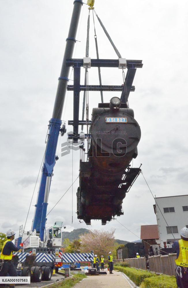 Steam locomotive brought back to railway park in western Japan