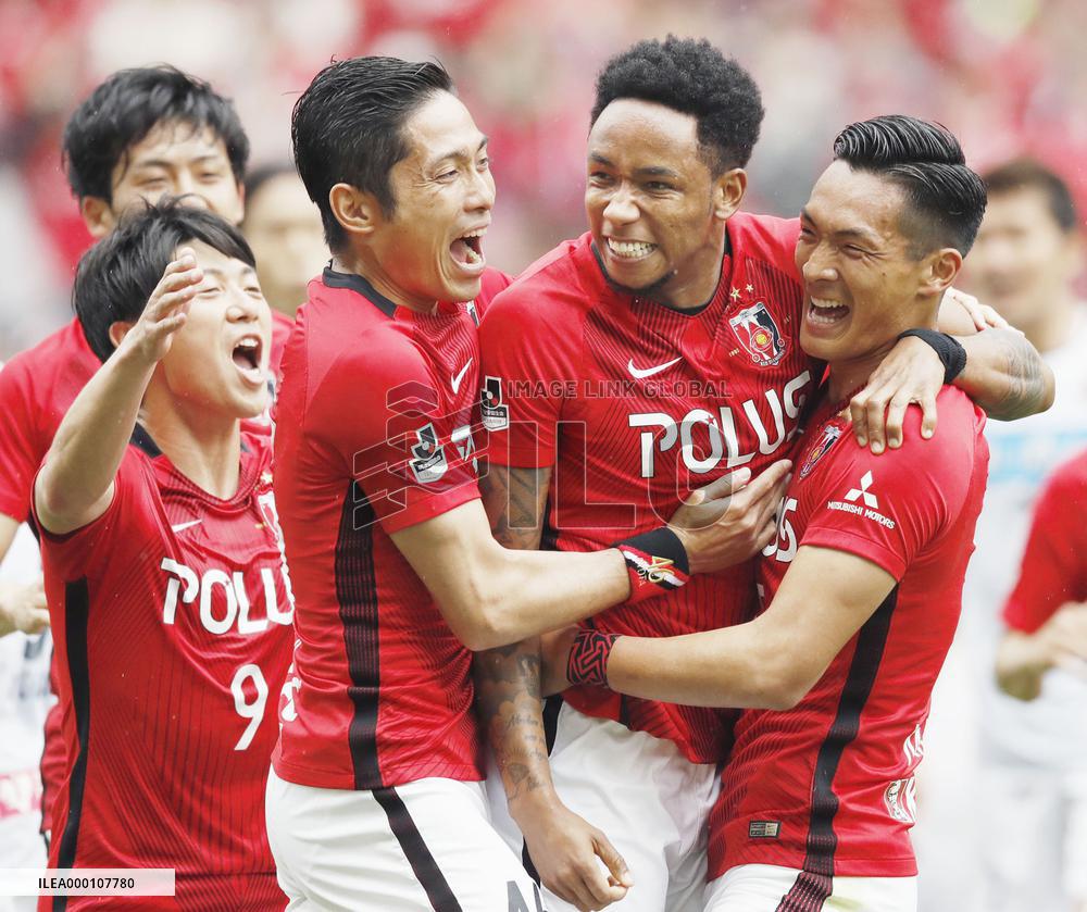 Reds edge Sapporo to maintain lead in J-League