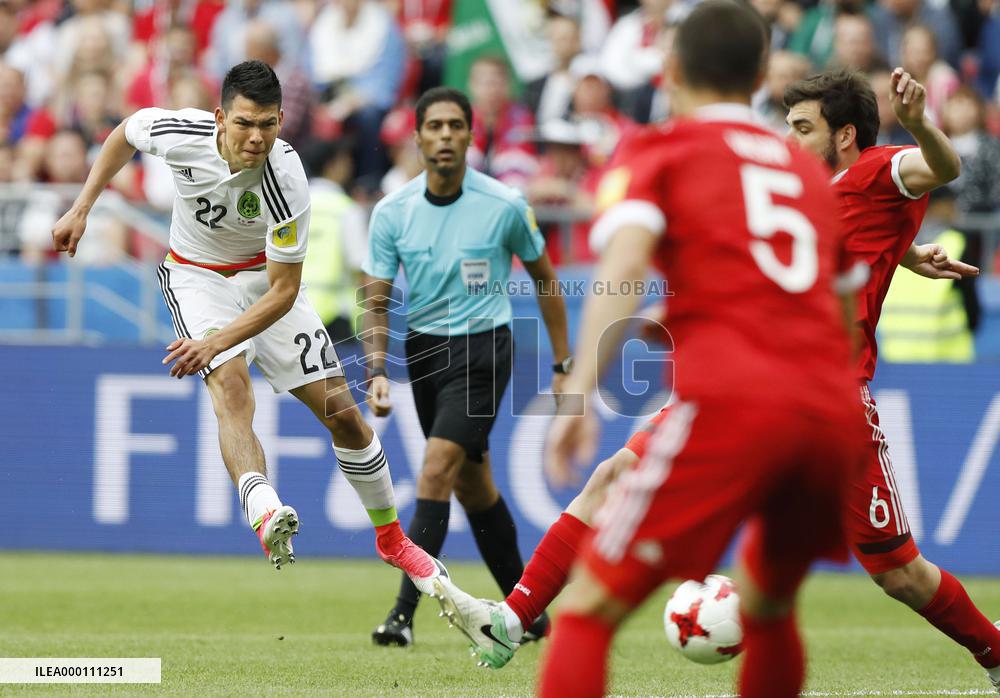 Soccer: Mexico reach Confederations Cup semis
