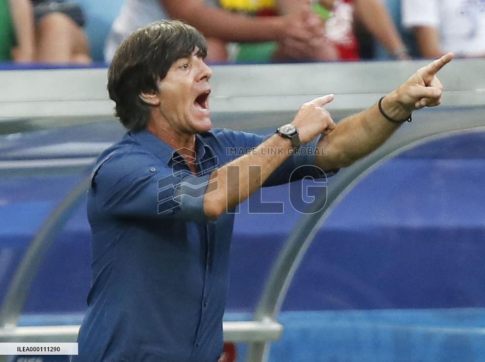 Soccer: Low picks up 100th win as Germany coach