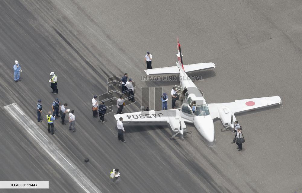 Small plane collapses on landing at Nagasaki airport