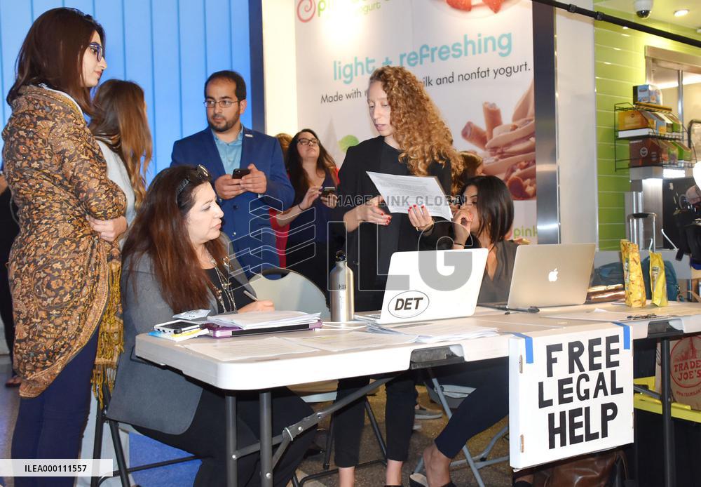 Legal aid desk at LAX helps people affected by Trump's travel ban