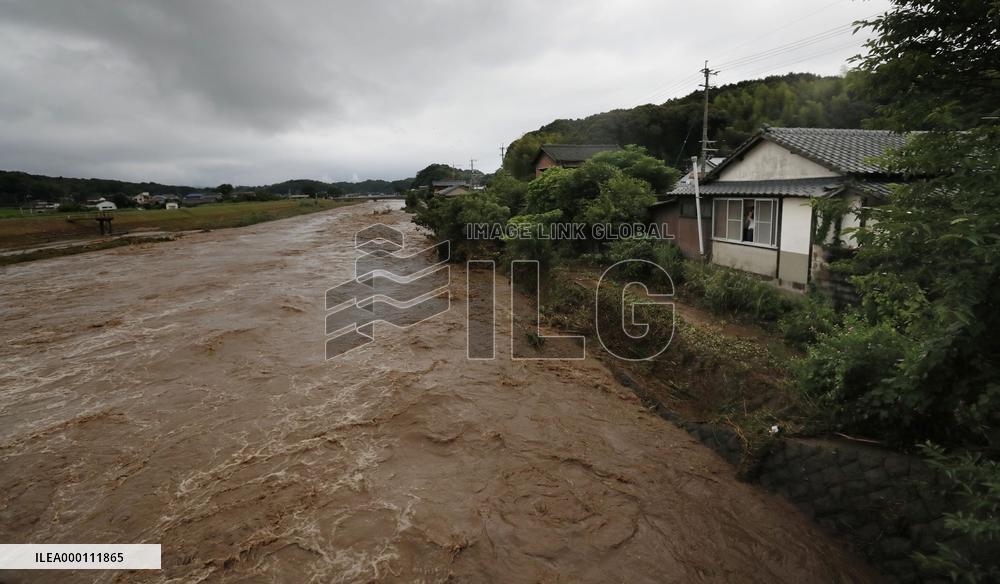 River flooding reported as heavy rain hits southwestern Japan