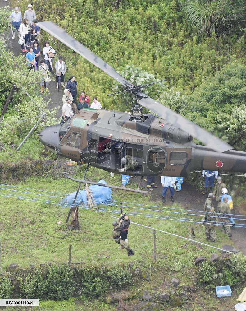 Rescue efforts continue as heavy rain kills 2 in southwestern Japan