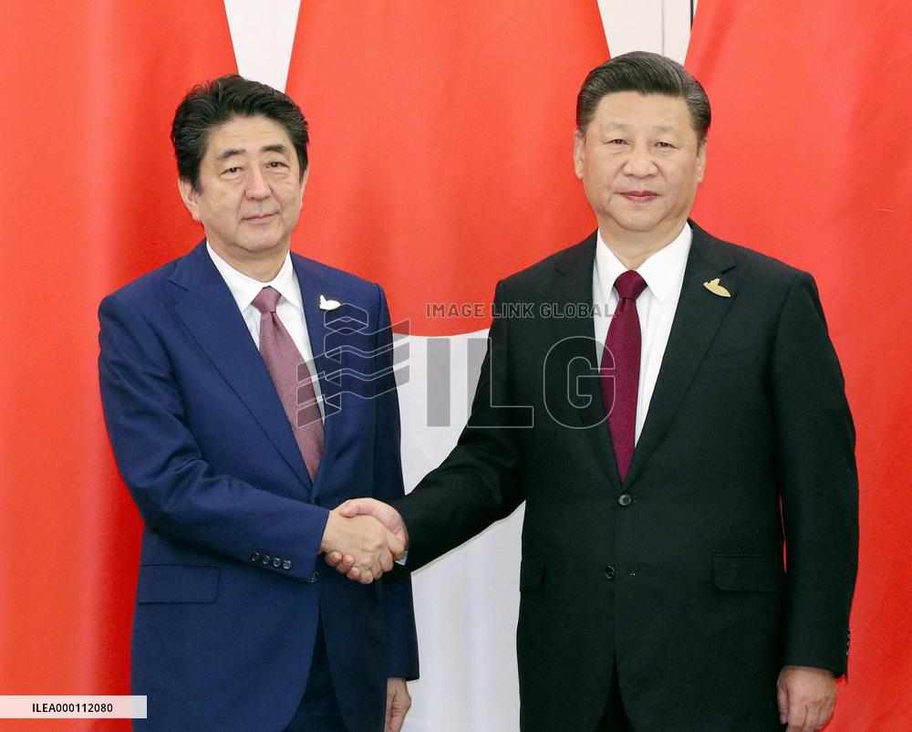 Abe, Xi hold talks on bilateral ties, N. Korea