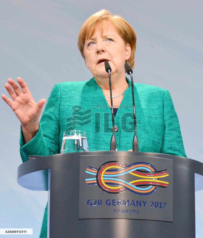 G-20 leaders agree on free trade, divided over climate change