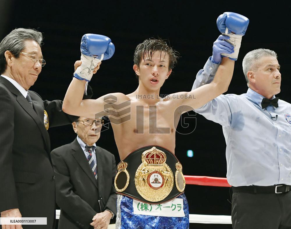 Boxing: Japan's Taguchi defends WBA light flyweight title