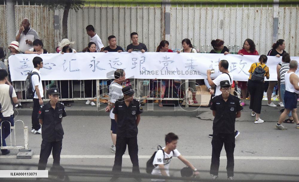Rare huge protest staged in Beijing over firm under fraud probe