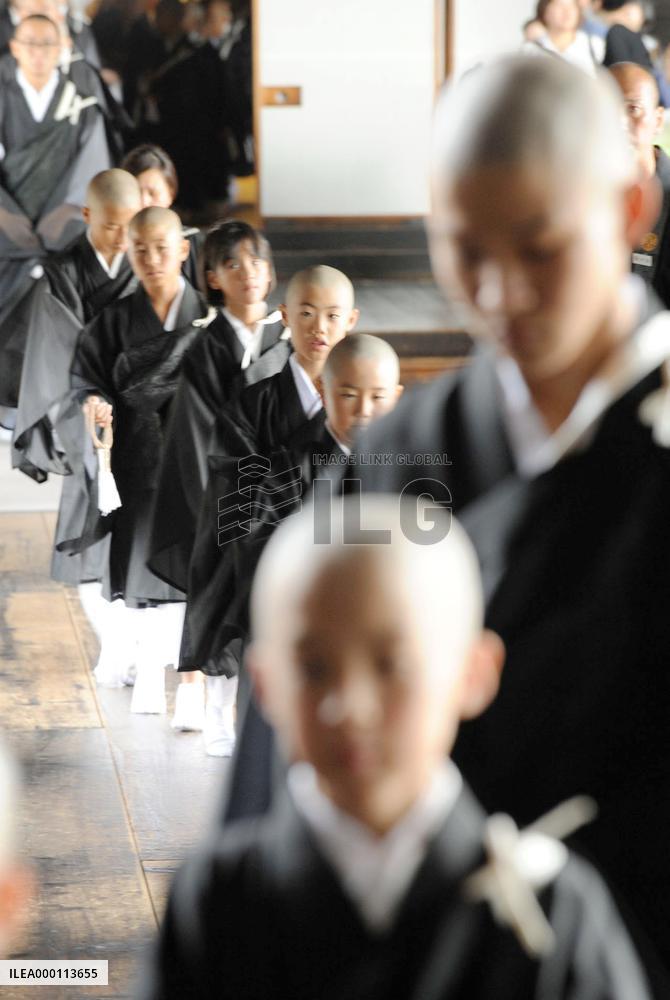 Children become Buddhist priests