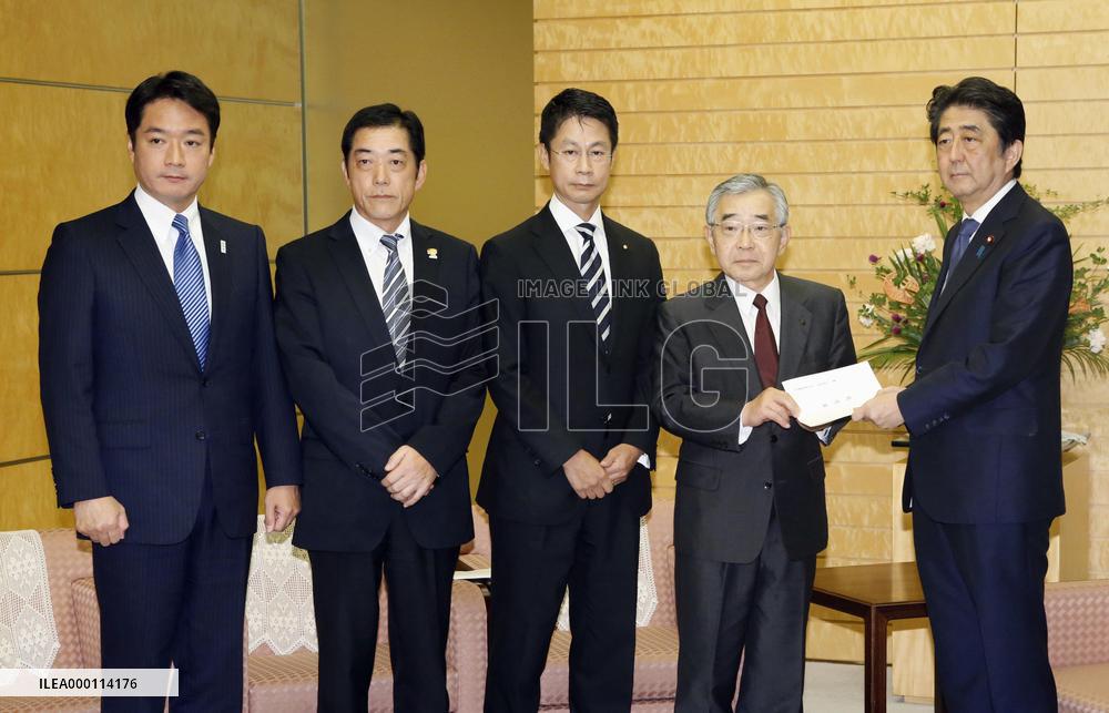 Abe vows to ensure residents' safety from possible N. Korean missiles