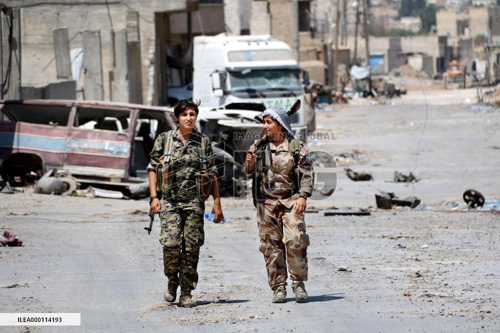Kurdish soldiers in Syrian city of Raqqa