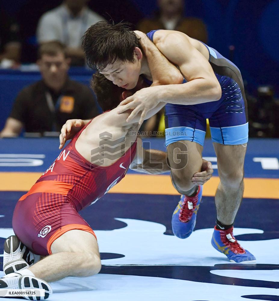 Takahashi wins gold in 57-kg FS at Paris worlds