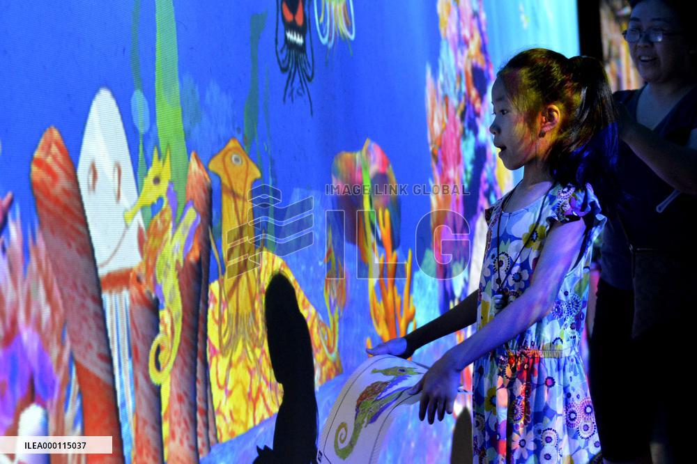 Digital art exposition attracts Chinese people