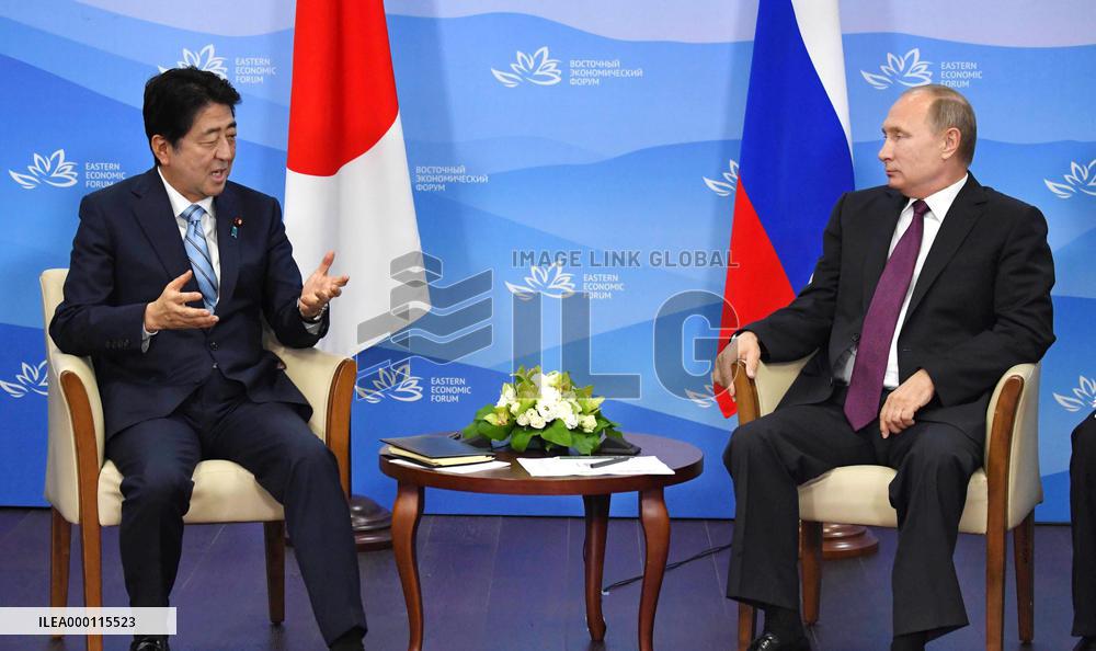 Abe, Putin meet to discuss N. Korea tensions, isles row