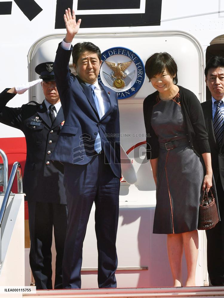 Abe leaves for India for talks with Modi, new railway event