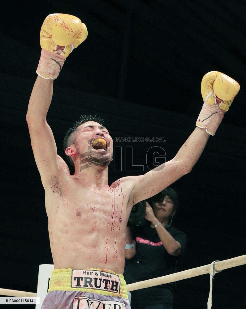 Iwasa wins world title
