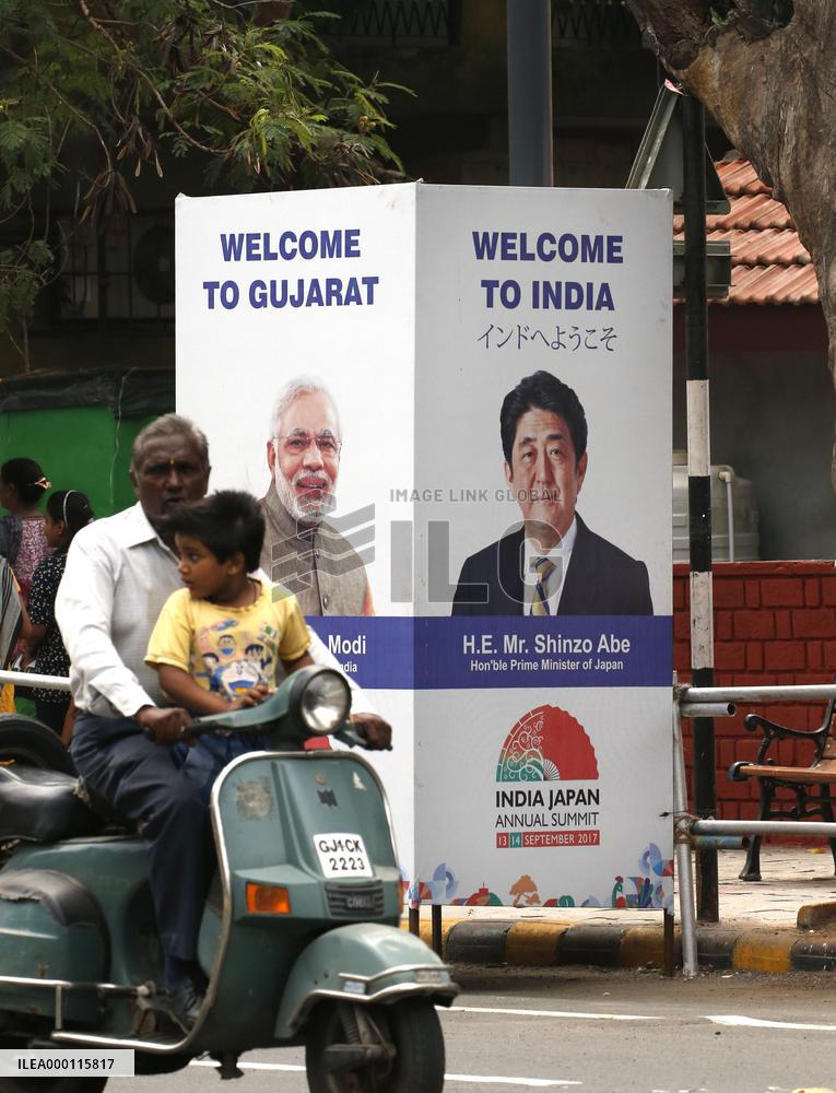 Abe in India for talks with Modi, new high-speed train ceremony
