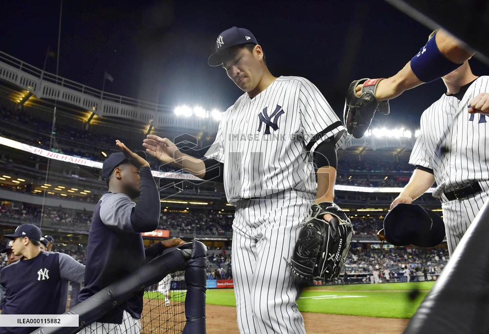 Baseball: Tanaka earns 12th win as Yankees beat Orioles