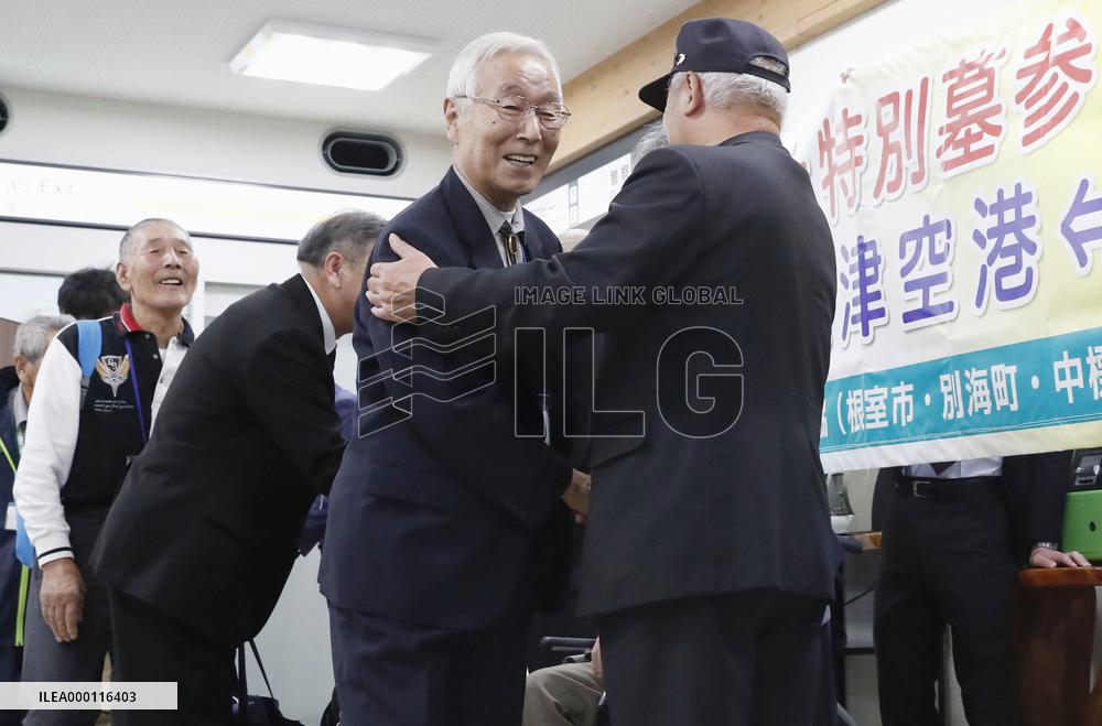 Ex-residents of Russian-held isles return home