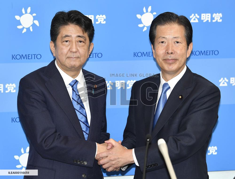 Abe dissolves lower house as opposition bands together