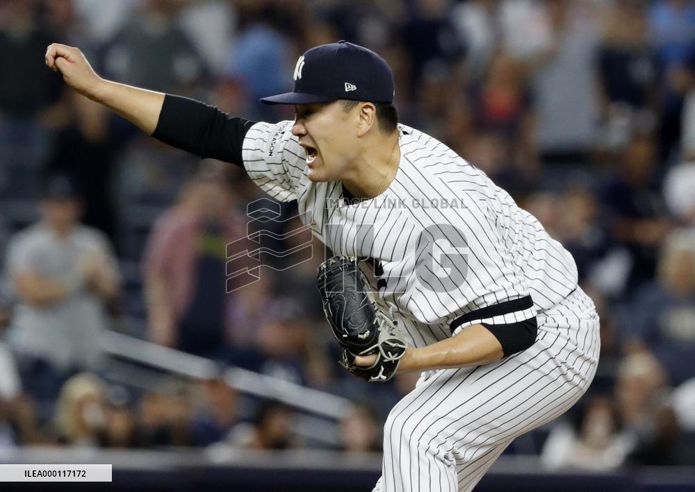 Tanaka keeps Yankees alive in ALDS