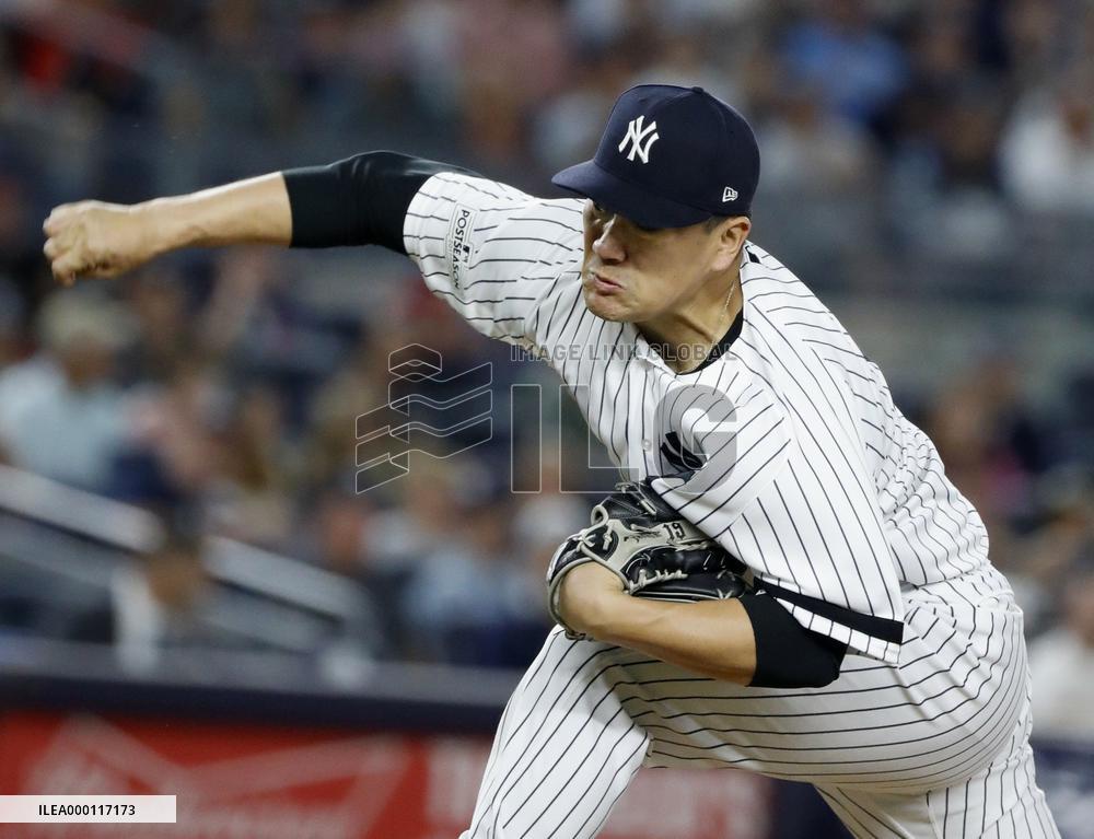 Tanaka keeps Yankees alive in ALDS