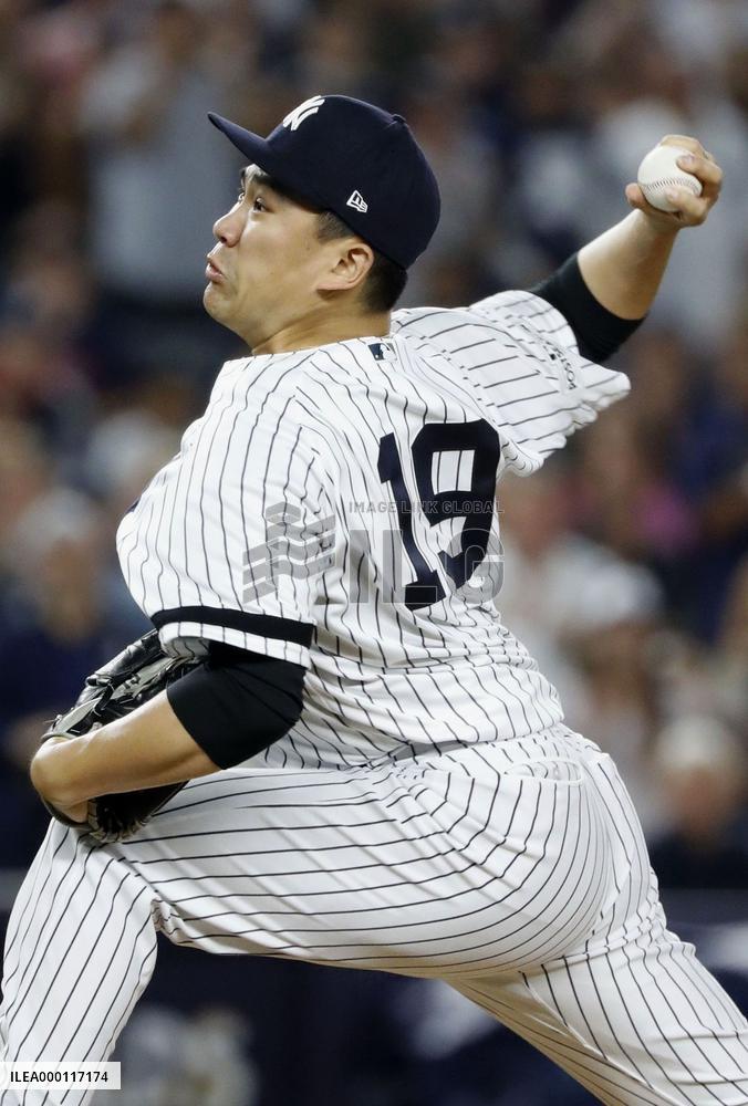 Tanaka keeps Yankees alive in ALDS