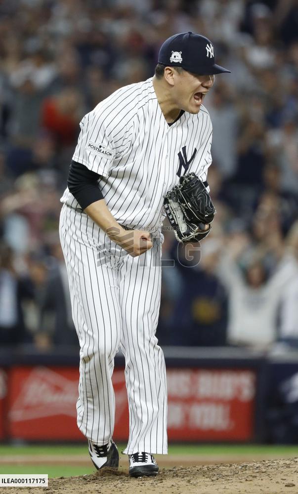 Tanaka keeps Yankees alive in ALDS