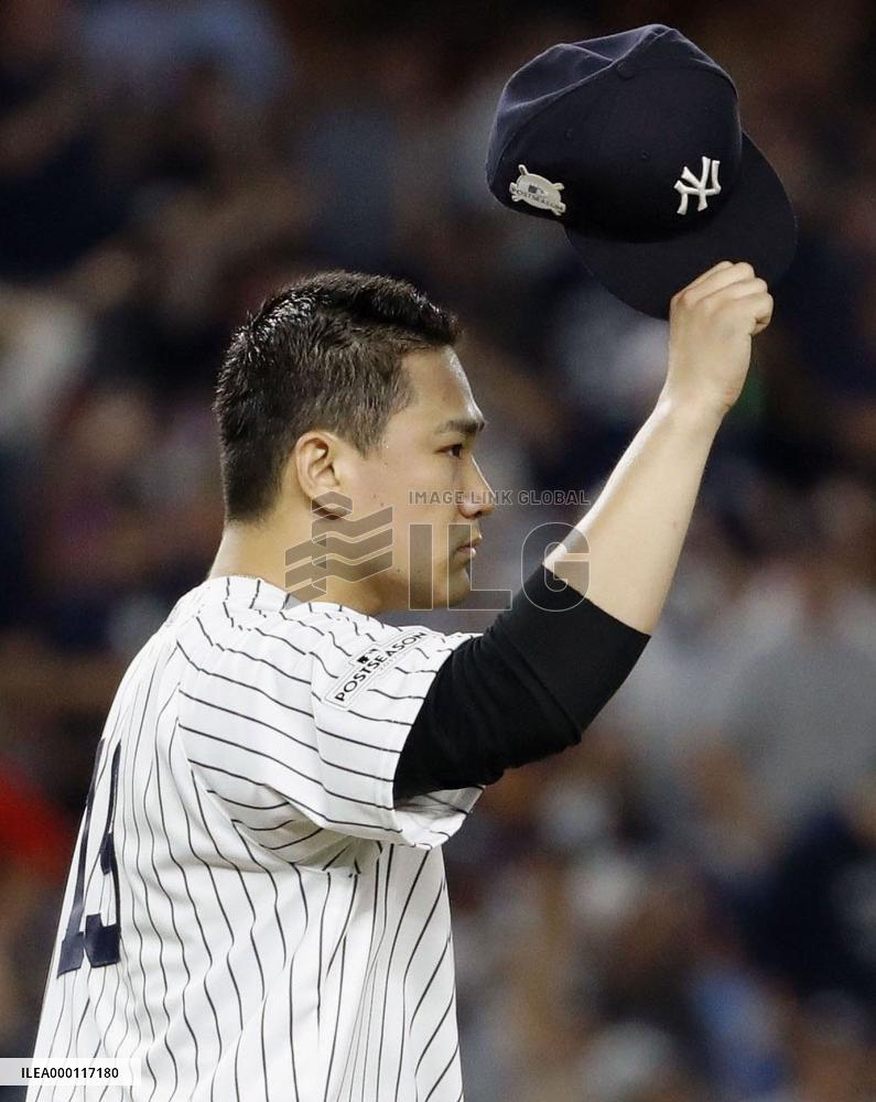 Tanaka keeps Yankees alive in ALDS