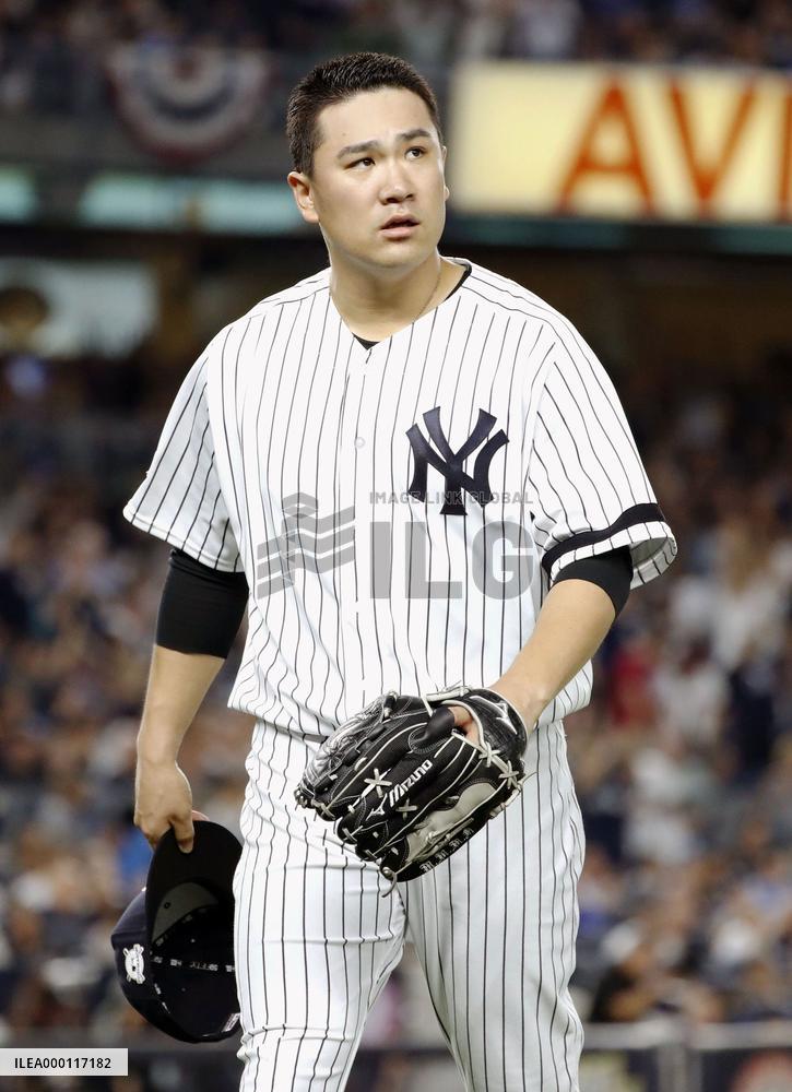 Tanaka keeps Yankees alive in ALDS