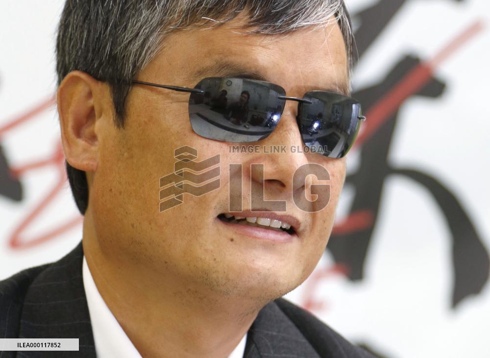 Activist Chen attends interview in Tokyo