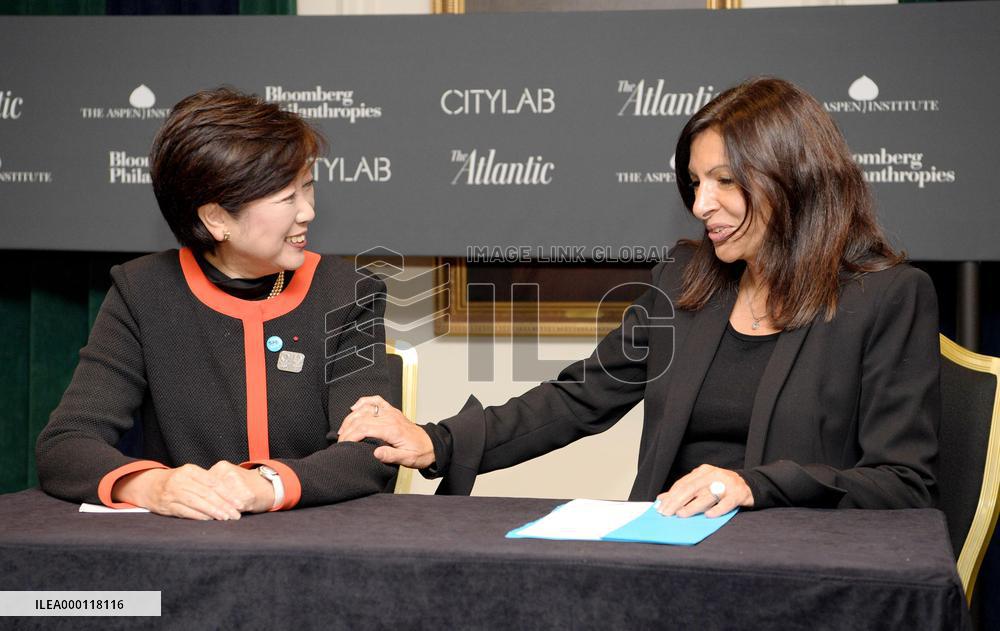 Tokyo governor, Paris mayor meet