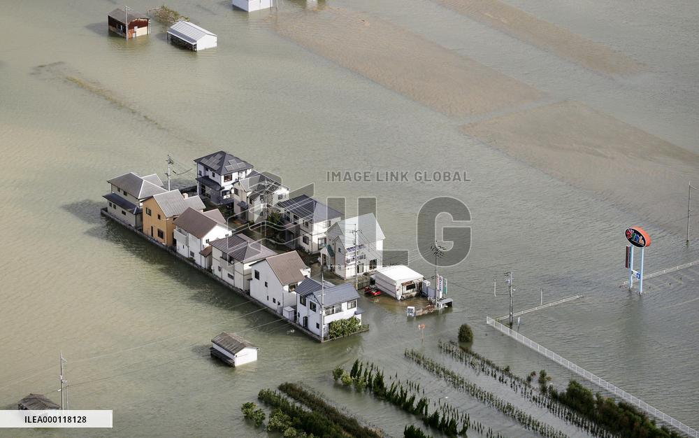 Part of western Japan city flooded following torrential rain