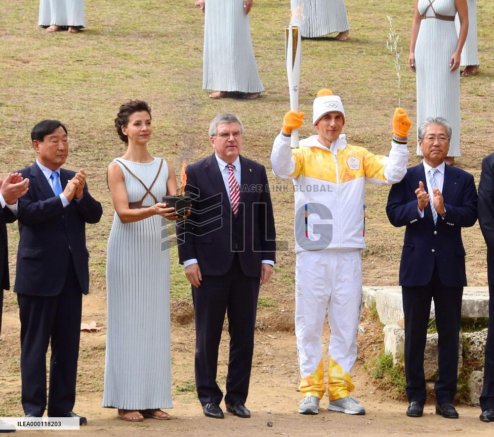 Olympic flame lit, to travel to S. Korea for Pyeongchang Games