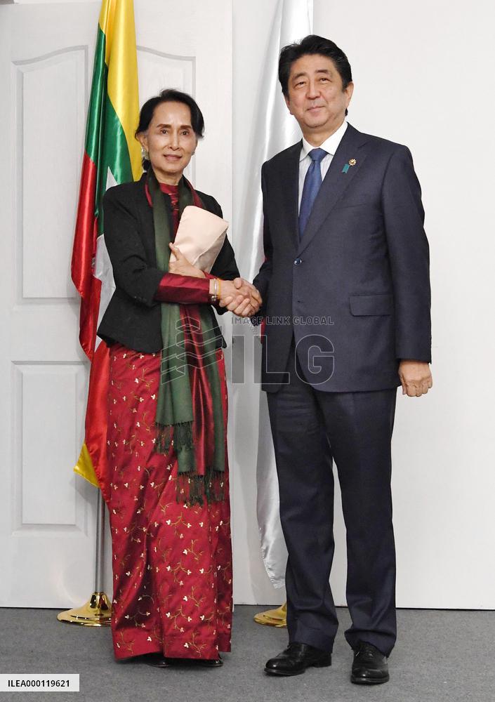 Suu Kyi, Abe