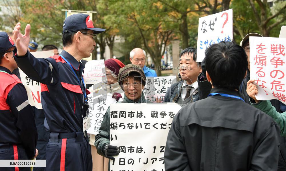 Japanese city conducts missile evacuation drill, faces protest