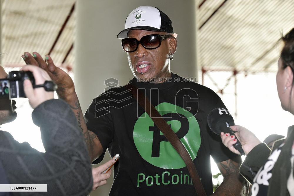 Rodman at Beijing airport