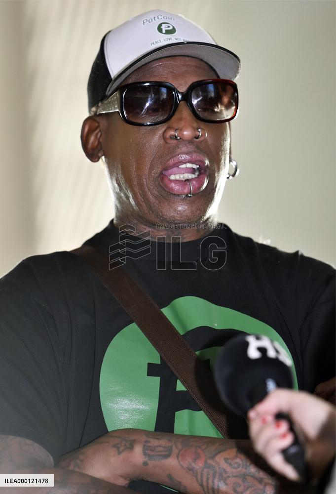 Rodman at Beijing airport