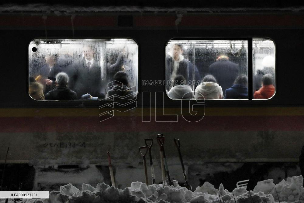 Train stranded by heavy snow in Japan