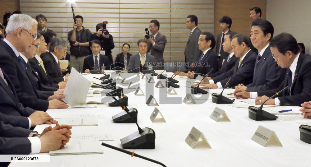 Japan lifts assessment on economy