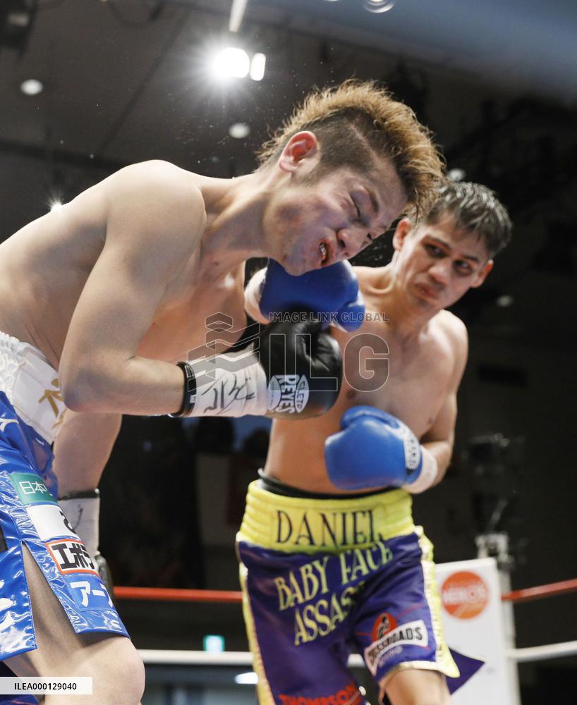 Boxing: Roman beats Matsumoto to keep WBA super bantamweight title
